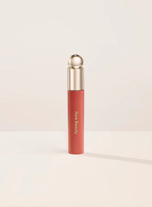 Soft pinch tinted lip oil tono Joy - RARE BEAUTY