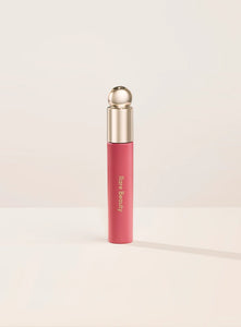 Soft pinch tinted lip oil tono Happy - RARE BEAUTY